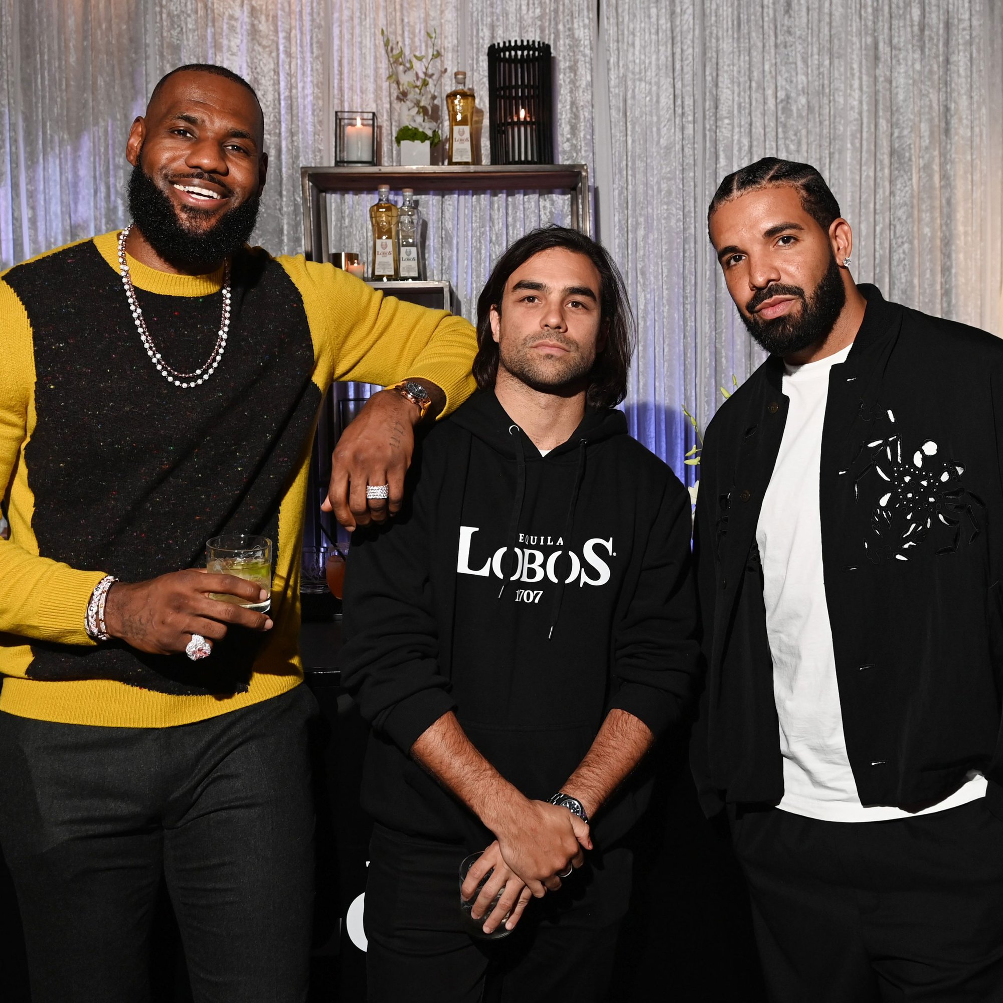Lebron James, Diego, and Drake stand together posing at the LOBOS tequila launch.